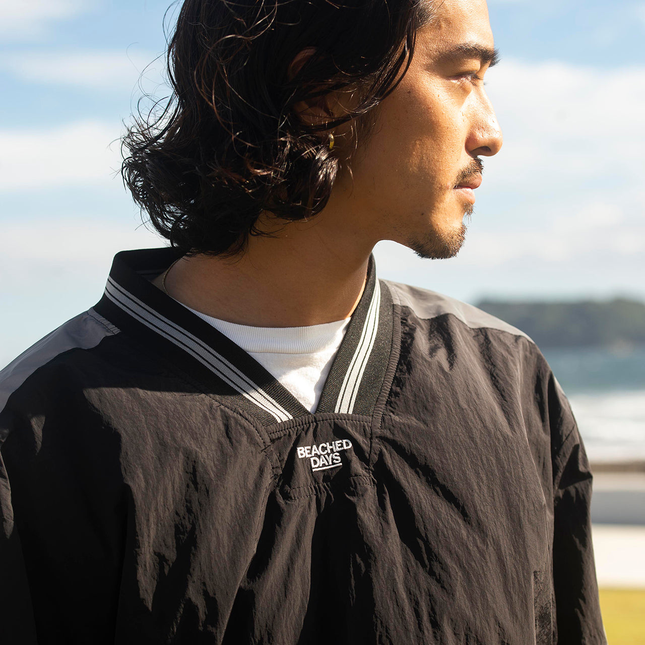 Reflective V-neck pullover