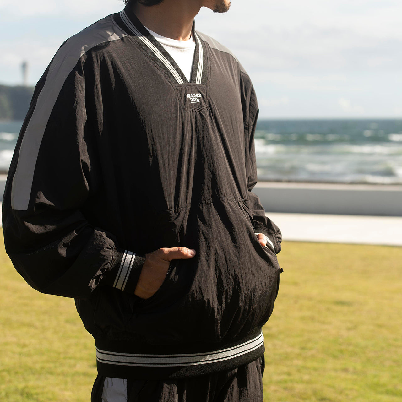 Reflective V-neck pullover